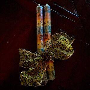 Pair of African inspired taper candles.